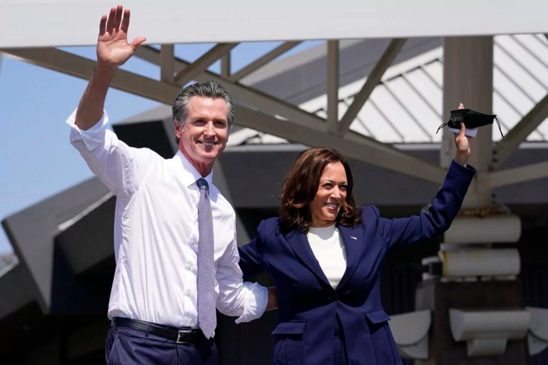 Gov. Gavin Newsom (D-CA) and former Vice President Kamala Harris wave during a campaign event at the IBEW-NECA Joint Apprenticeship Training Center in San Leandro, California, Wednesday, Sept. 8, 2021.