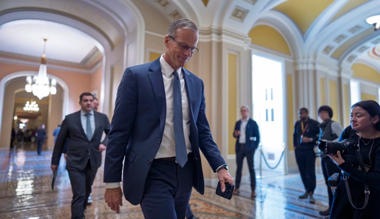 Senate Majority Leader John Thune (R-SD) walks to the chamber as the Republican-controlled Senate moves to confirm Kash Patel, President Donald Trump's nominee for FBI director, at the Capitol in Washington, Thursday, Feb. 20, 2025.