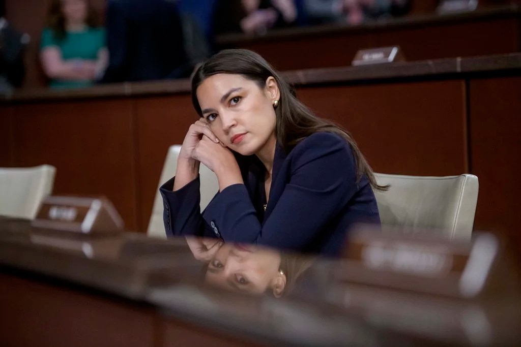 Rep. Alexandria Ocasio-Cortez, D-N.Y., listens to the testimony of the witnesses during a House Committee on Oversight and Government Reform hearing with Sanctuary City Mayors on Capitol Hill, Wednesday, March 5, 2025, in Washington. 