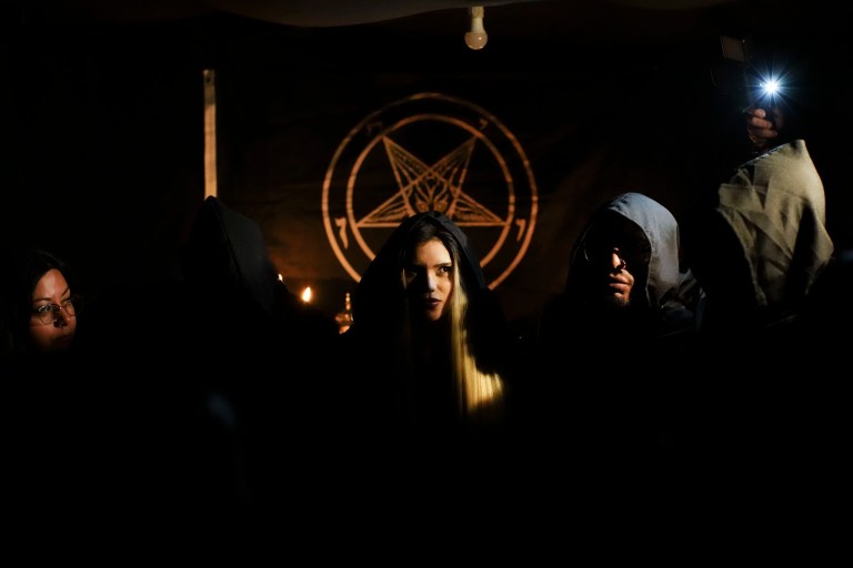 Satariel, center, a member of The Temple of Satan: Satanists and Luciferians of Chile, takes part in a Celtic pagan celebration, in Santiago, Thursday, Oct. 31, 2024.