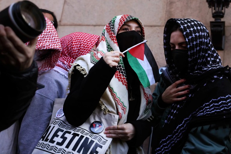Protesters rally in support of detained Palestinian activist Mahmoud Khalil outside Columbia University in New York on Friday, March 14, 2025.