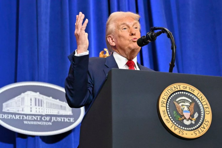 President Donald Trump speaks at the Justice Department in Washington, Friday, March 14, 2025. (Pool via AP)
