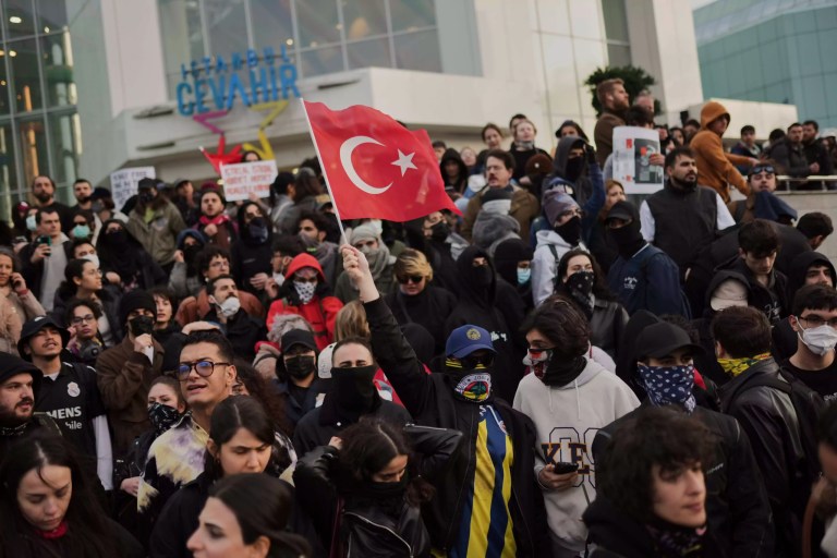 People shout slogans during a protest called by university students in Istanbul, Turkey, Thursday, March 27, 2025, after Istanbul's Mayor Ekrem İmamoğlu was arrested and sent to prison.