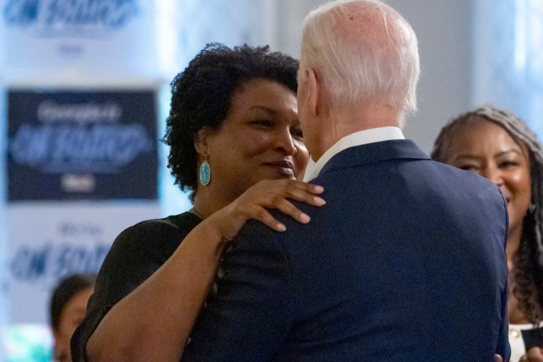 President Joe Biden greets Stacey Abrams at Mary Mac's Tea Room, Saturday, May 18, 2024, in Atlanta.