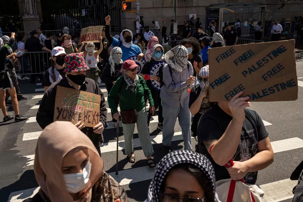 Pro-Palestinian supporters march to Barnard College during the picket line outside Columbia University, Tuesday, Sept. 3, 2024, in New York.