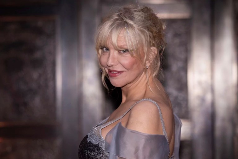 Courtney Love poses for photographers upon arrival at the National Portrait Gallery reopening, Tuesday, June 20, 2023, in London.