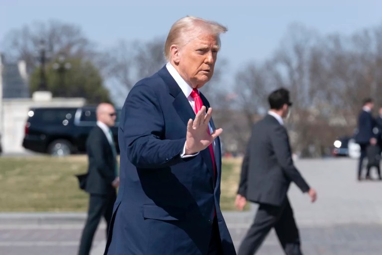 President Donald Trump waves to the media as he leaves after a luncheon with the Speaker of the House Mike Johnson, R-La., and Ireland's Prime Minister Micheal Martin at the U.S. Capitol on Wednesday, March 12, 2025, in Washington.