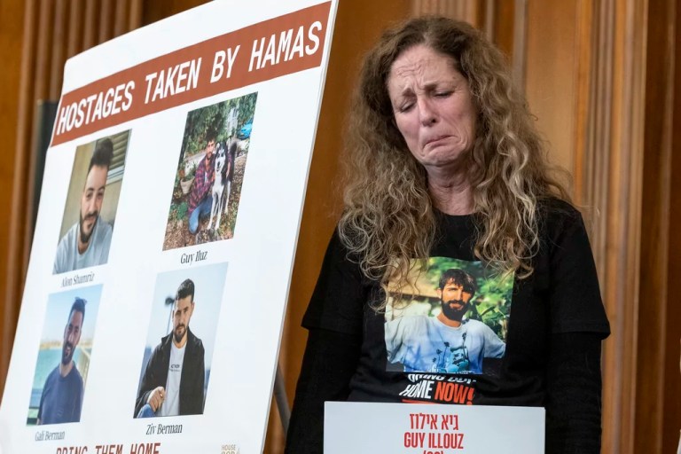 Doris Liber, whose son, Guy Iluz, is being held hostage in Gaza, holds in her emotions during a news conference with House Republicans at the Capitol in Washington on Tuesday, Nov. 7, 2023.