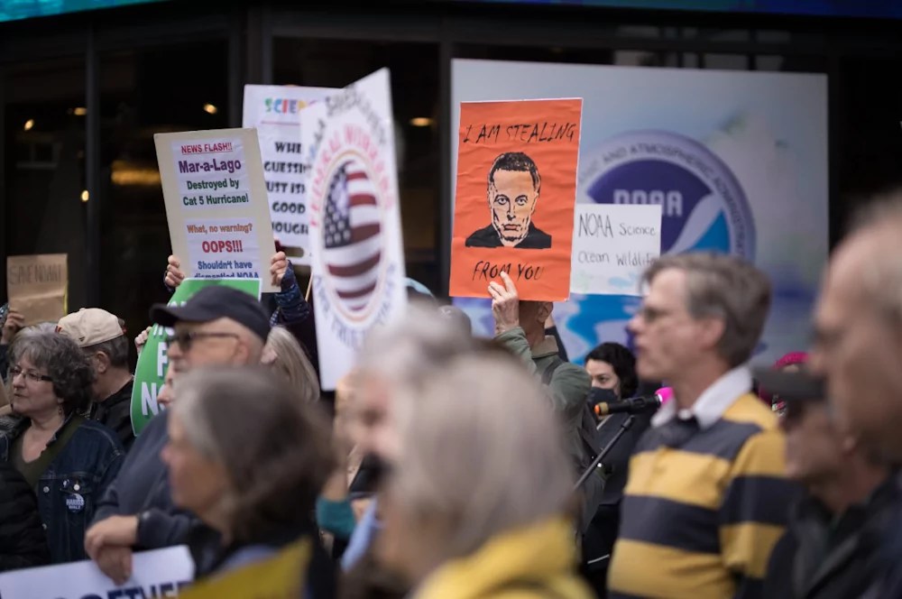 A protest in support of federal workers outside the National Oceanic and Atmospheric Administration in Silver Spring, Maryland on Thursday, March 21, 2025. The federal workforce has been cut through efforts backed by Elon Musk's Department of Government Efficiency. (Graeme Jennings/Washington Examiner)