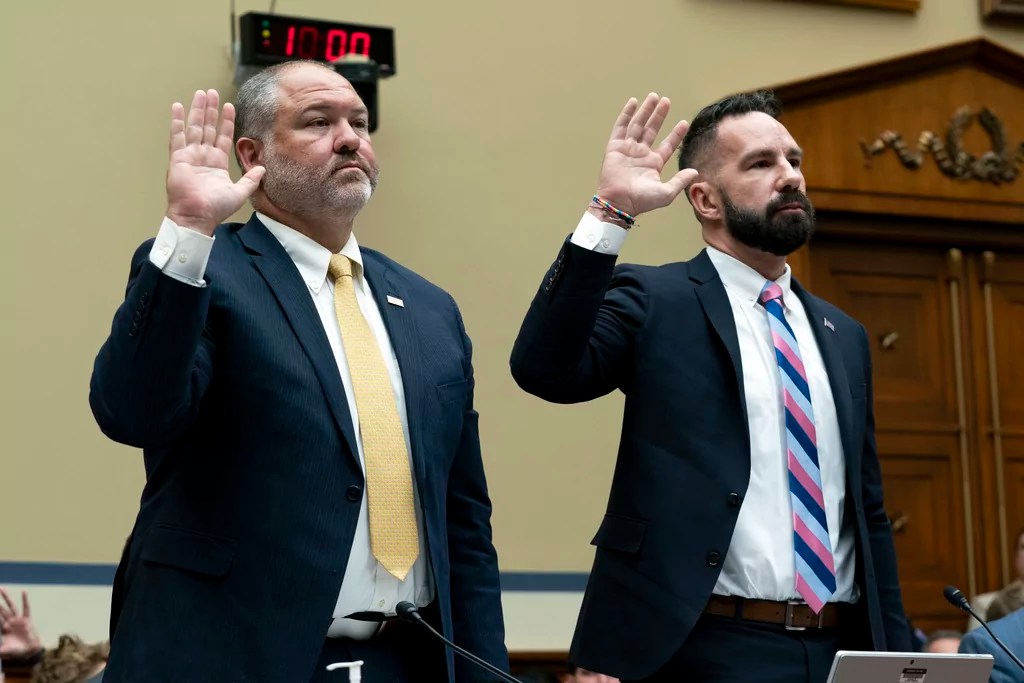 IRS Supervisory Special Agent Gary Shapley, left, and Joseph Ziegler, an IRS Agent with the criminal investigations division, are sworn in at a House Oversight and Accountability Committee hearing with IRS whistleblowers, Wednesday, July 19, 2023, in Washington. (AP Photo/Stephanie Scarbrough)