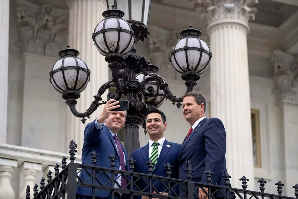 From left, Reps. Jeff Hurd, R-Colo., Gabe Evans, and Rep Jeff Crank, R-Colo., pose for a selfie on the steps of the Capitol, Friday, Nov. 15, 2024, in Washington.