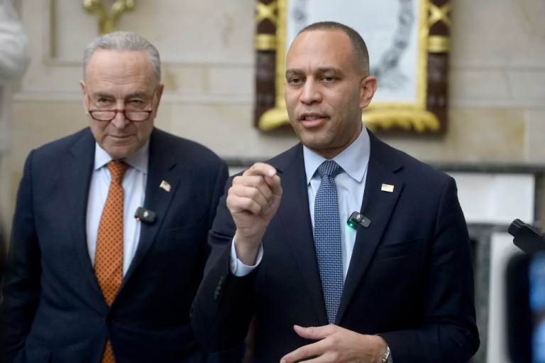 FILE - House Minority Leader Hakeem Jeffries, D-N.Y., right, is joined by Senate Minority Leader Chuck Schumer, D-N.Y., for a press conference in Statuary Hall at the Capitol, Feb. 12, 2025, in Washington.