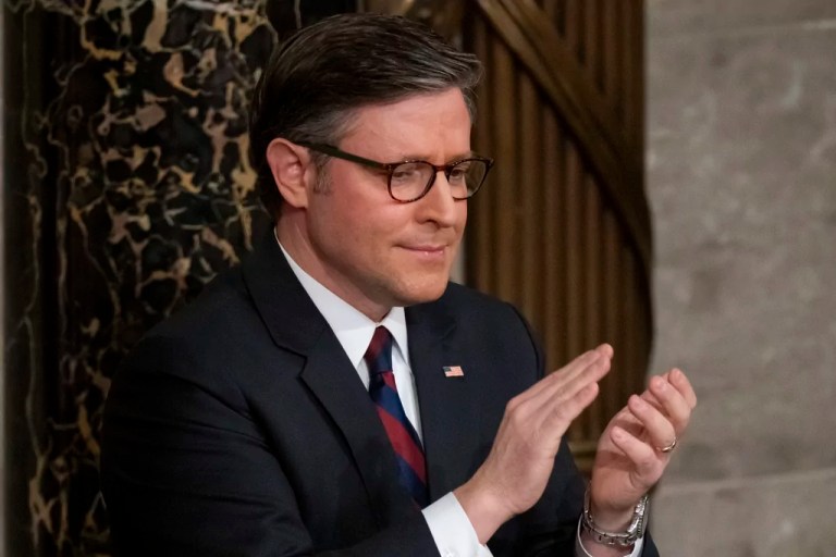 House Speaker Mike Johnson (R-LA) applauds as President Donald Trump addresses a joint session of Congress on Capitol Hill in Washington, Tuesday, March 4, 2025.