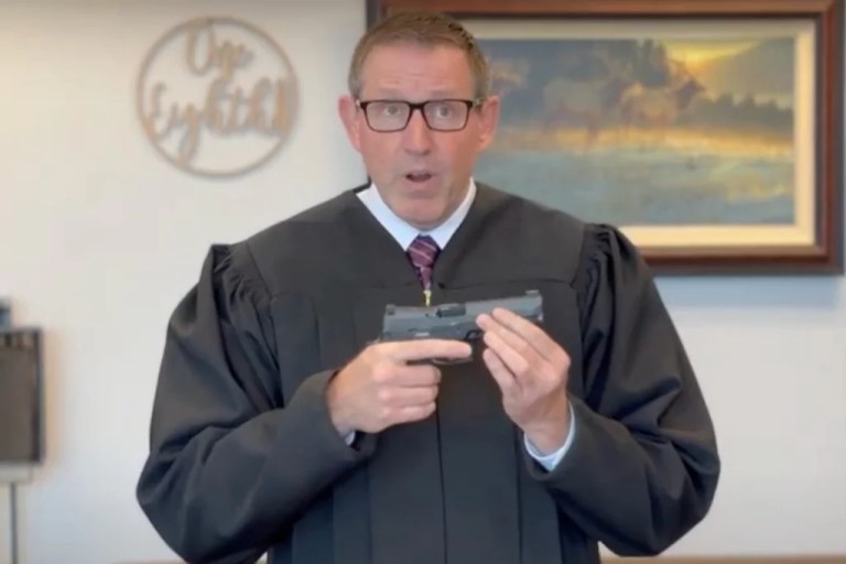 Judge Lawrence VanDyke, a Trump appointee, shows off a pistol in a rare gun demonstration video serving as his dissent from the ruling.