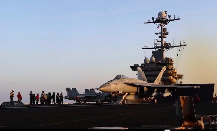 This image taken from video provided by the U.S. Navy shows an aircraft launching from the USS Harry S. Truman in the Red Sea before airstrikes in Sanaa, Yemen, Saturday, March 15, 2025.