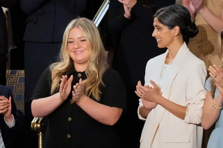 Payton McNabb, left, claps as second lady Usha Vance watches President Donald Trump's address to a joint session of Congress at the Capitol in Washington, Tuesday, March 4, 2025.