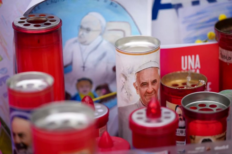 Candles for Pope Francis are seen in front of the Agostino Gemelli Polyclinic, in Rome, Friday, March 7, 2025, where the Pontiff has been hospitalized since Friday, Feb. 14.