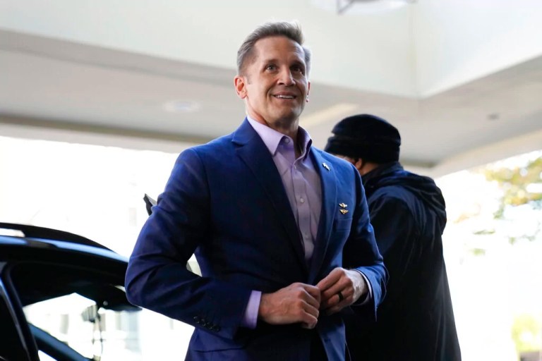 Rep.-elect Rich McCormick, R-Ga., arrives for New Member Orientation check-in and program registration at the Hyatt Regency, in Washington, Sunday, Nov. 13, 2022. (AP Photo/Carolyn Kaster)