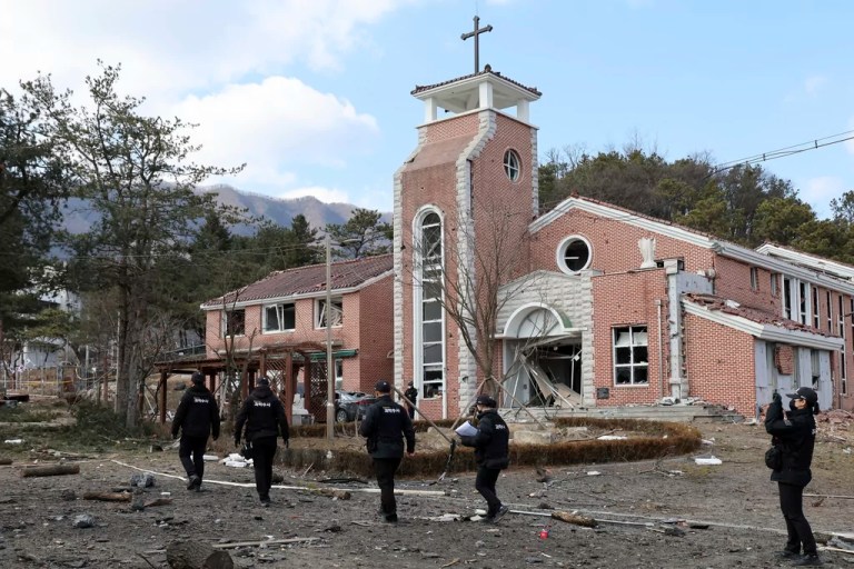 South Korean military investigators examine the site where a South Korean fighter jet accidentally dropped bombs on a civilian area during training in Pocheon, South Korea, Thursday, March 6, 2025.