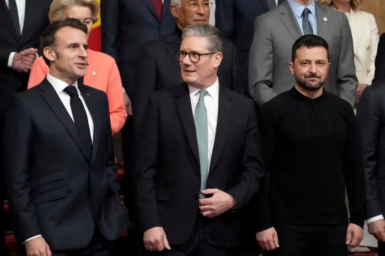 From left, French President Emmanuel Macron, Britain's Prime Minister Keir Starmer and Ukraine's President Volodymyr Zelenskyy pose during a group photo at a summit on Ukraine at Lancaster House in London, Sunday, March 2, 2025.