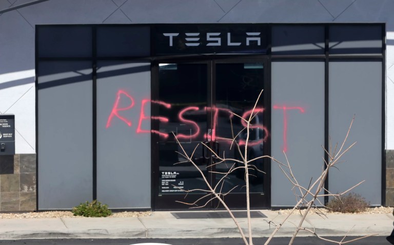 Police arrest suspect in Las Vegas arson attack at Tesla dealership