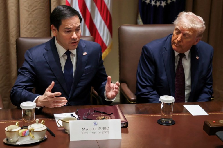 President Donald Trump listens as Secretary of State Marco Rubio speaks during a cabinet meeting at the White House in Washington, Monday, March 24, 2025.