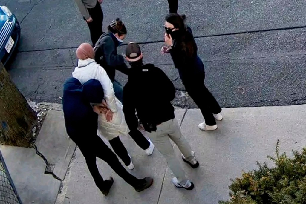 n this image taken from security camera video, Rumeysa Ozturk, a 30-year-old doctoral student at Tufts University, is detained by Department of Homeland Security agents on a street in Sommerville, Mass., Tuesday, March 25, 2025.