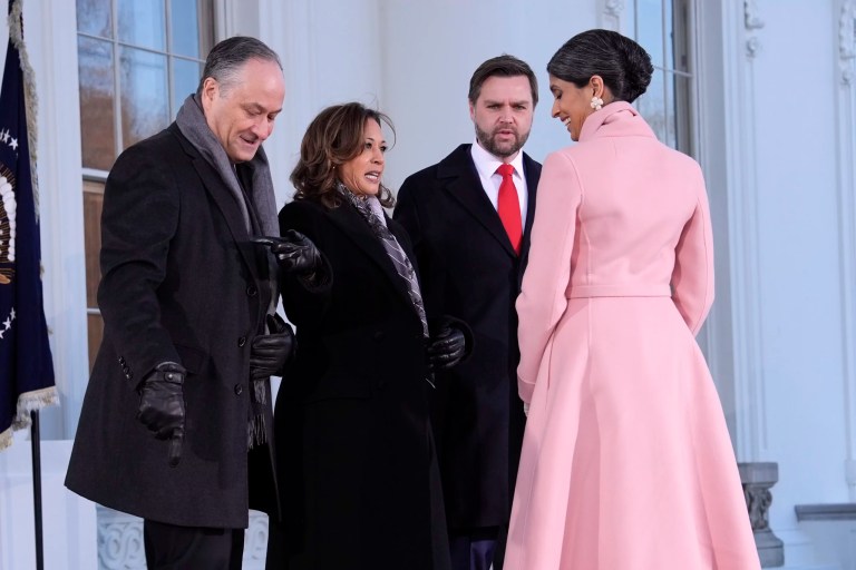 Vice President Kamala Harris, center left, and second gentleman Doug Emhoff, left, greet Vice President-elect JD Vance, center right, and his wife, Usha Vance, right, upon arriving at the White House, Monday, Jan. 20, 2025, in Washington.