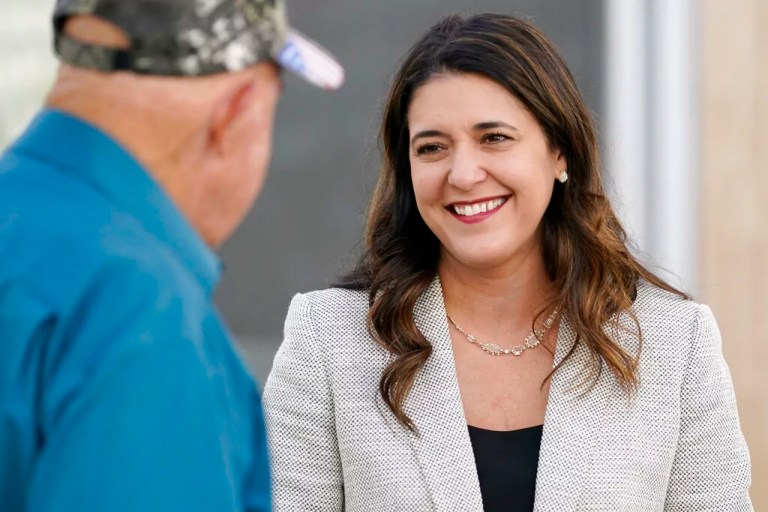 Rep. Stephanie Bice (R-OK) talks with people at a meet and greet event Wednesday, Sept. 30, 2020, in Oklahoma City. (AP Photo/Sue Ogrocki)