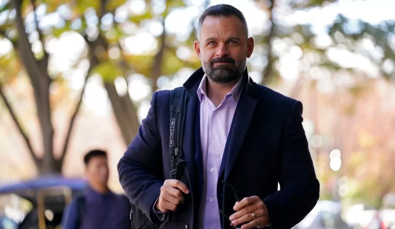 Rep.-elect Cory Mills, R-Fla., arrives for New Member Orientation check-in and program registration at the Hyatt Regency, in Washington, Sunday, Nov. 13, 2022. (AP Photo/Carolyn Kaster)