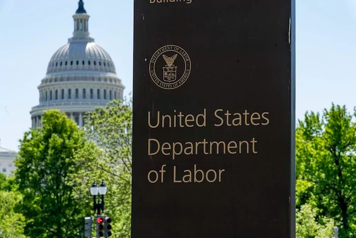 The entrance to the Labor Department is seen near the Capitol in Washington, Thursday, May 7, 2020, as it prepares to release a new unemployment report tomorrow. Nearly 3.2 million laid-off workers applied for unemployment benefits last week as business shutdowns caused by the COVID-19 pandemic deepened, resulting in the worst U.S. economic catastrophe in decades.