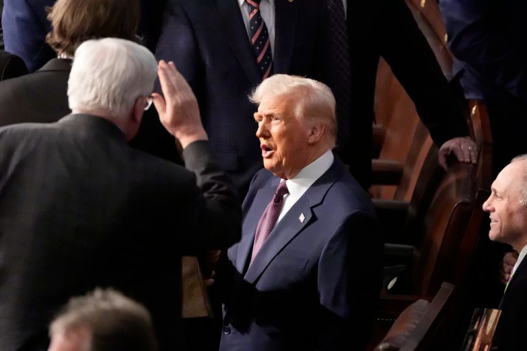 Members of Congress greet President Donald Trump as he arrives to address a joint session of Congress at the Capitol in Washington, Tuesday, March 4, 2025.