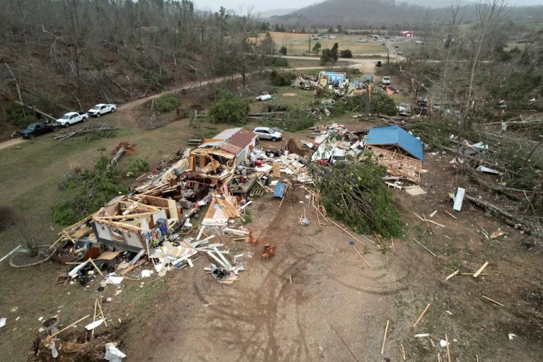 At least 32 dead in massive storm after new fatalities reported in Kansas and Mississippi
