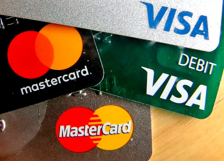 In this Feb. 20, 2019, file photo, credit cards are displayed in Zelienople, Pennsylvania.