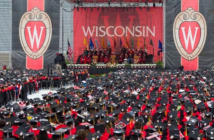 Graduating students listen to a commencement address at the University of Wisconsin in Madison, Wisconsin, May 12, 2018.