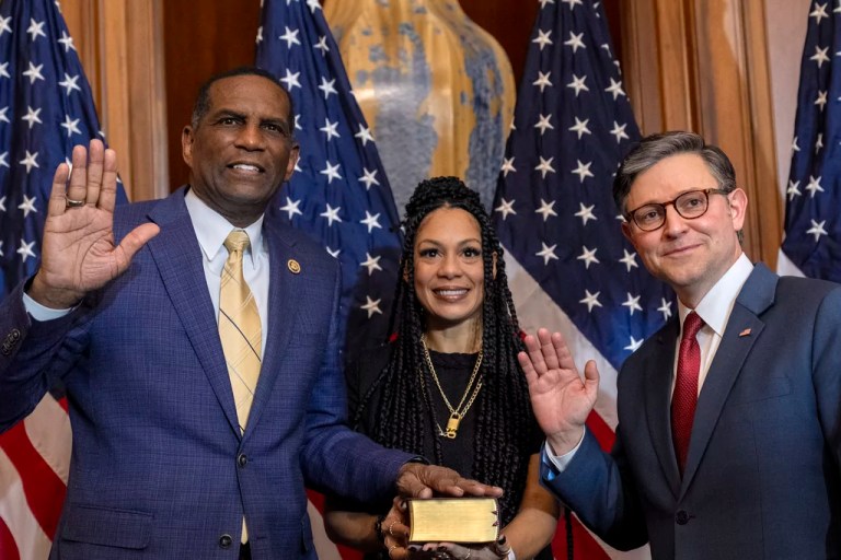 House Speaker Mike Johnson, R-La., right, poses during a ceremonial swearing-in with Rep. Burgess Owens