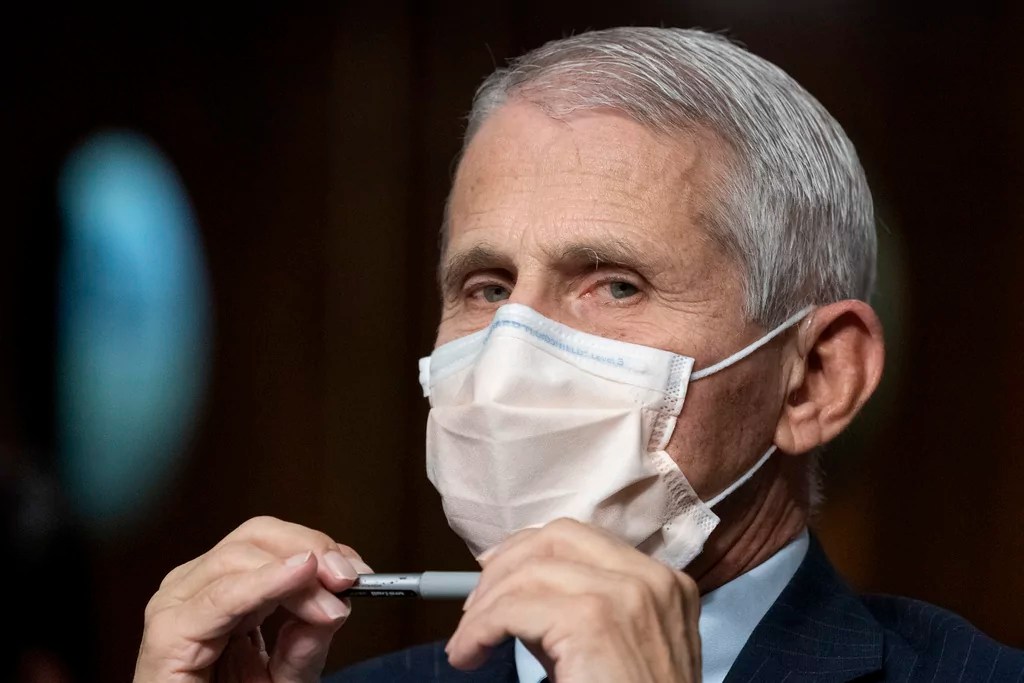 Dr. Anthony Fauci, director of the National Institute of Allergy and Infectious Diseases, listens during opening statements during a Senate Health, Education, Labor, and Pensions Committee hearing on Capitol Hill, Nov. 4, 2021, in Washington. 