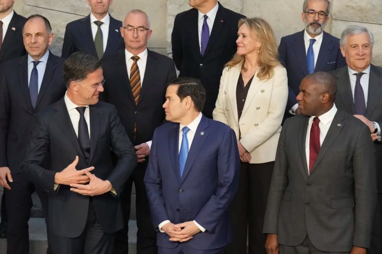 Secretary of State Marco Rubio, center, and NATO Secretary General Mark Rutte, left, pose with counterparts during a group photo of NATO foreign ministers at NATO headquarters Brussels, Thursday, April 3, 2025.