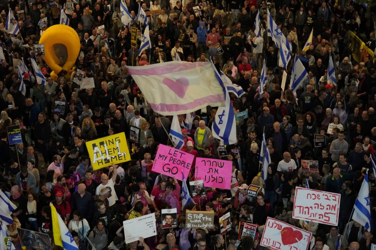 People take part in a protest demanding the immediate release of hostages held by Hamas in the Gaza Strip, in Tel Aviv, Israel, Saturday, April 5,2025.