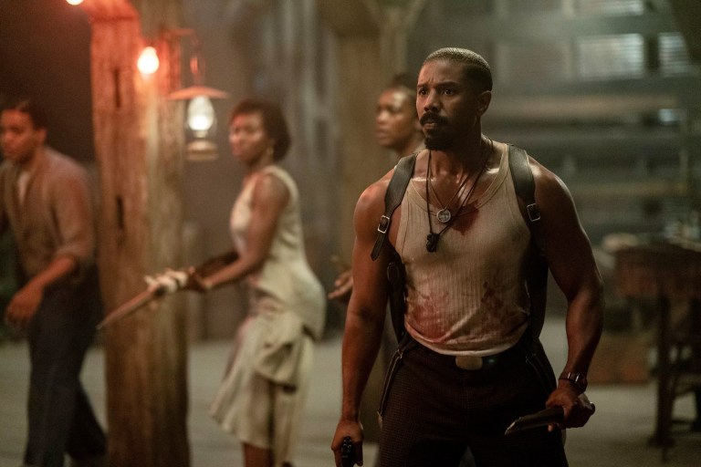 This image released by Warner Bros Pictures shows Michael B. Jordan, right, in a scene from 