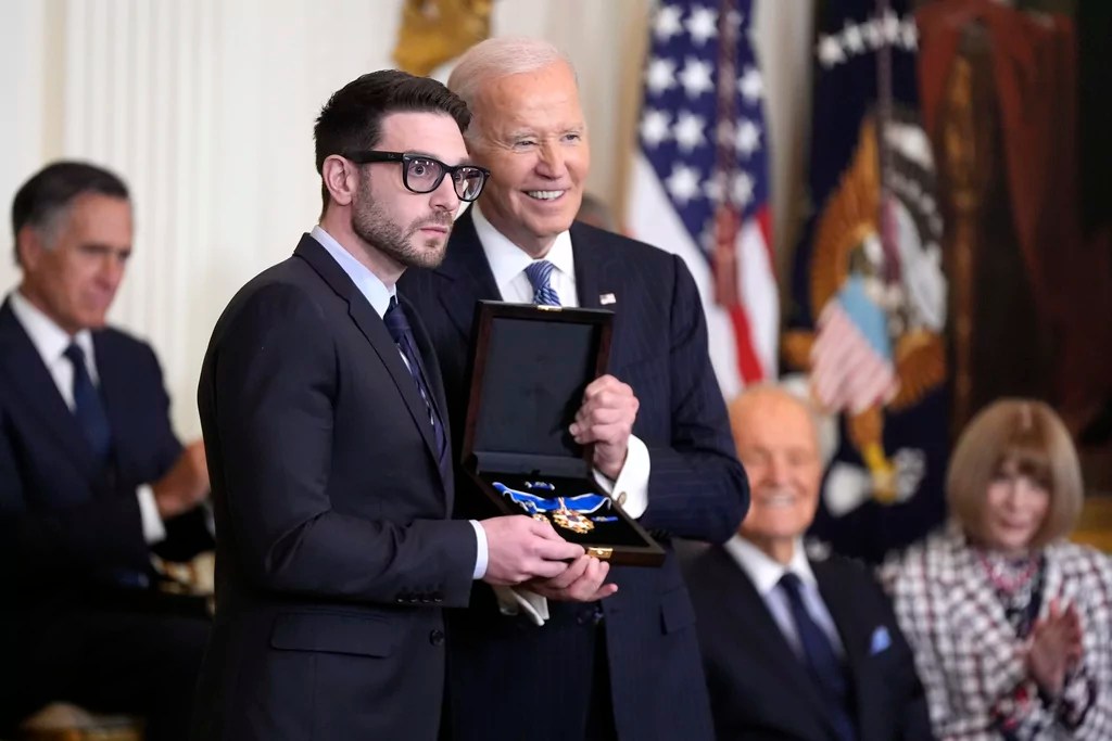 President Joe Biden, right, presents the Presidential Medal of Freedom, the Nation's highest civilian honor, to Alex Soros on behalf of his father George Soros, in the East Room of the White House, Saturday, Jan. 4, 2025, in Washington. 