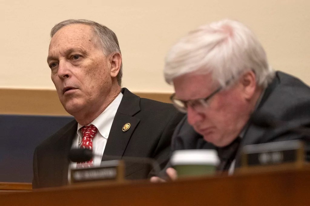 Rep. Andy Biggs, R-Ariz., left, listens during a joint subcommittee hearing of the House Judiciary Committee on Capitol Hill, Tuesday, April 1, 2025, in Washington.