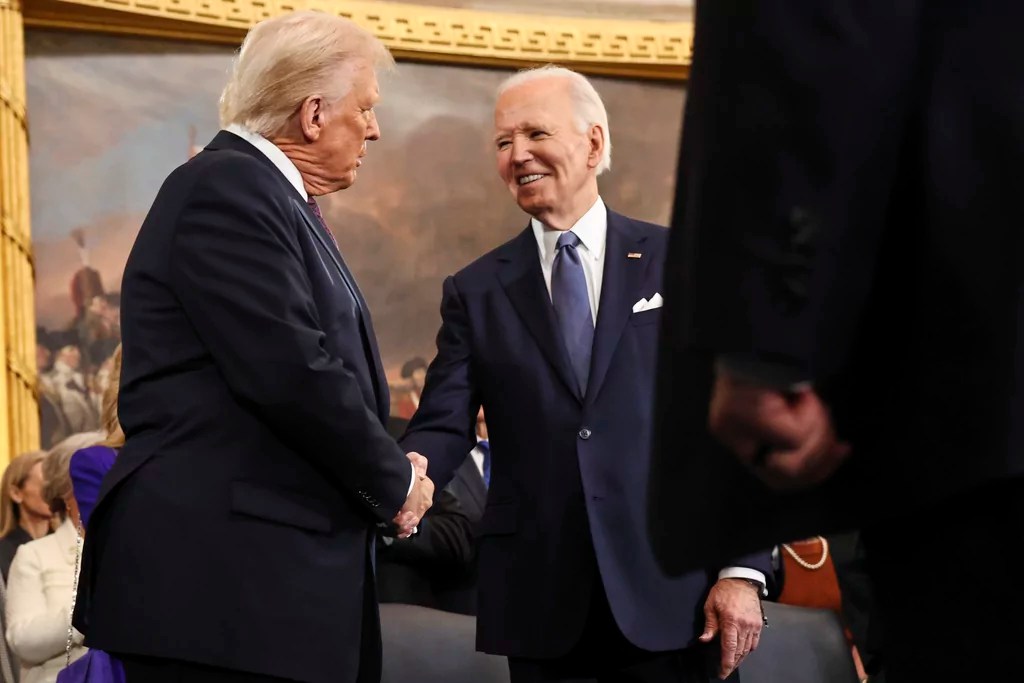 President-elect Donald Trump greets President Joe Biden during the 60th Presidential Inauguration in the Rotunda of the U.S. Capitol in Washington, Monday, Jan. 20, 2025. 