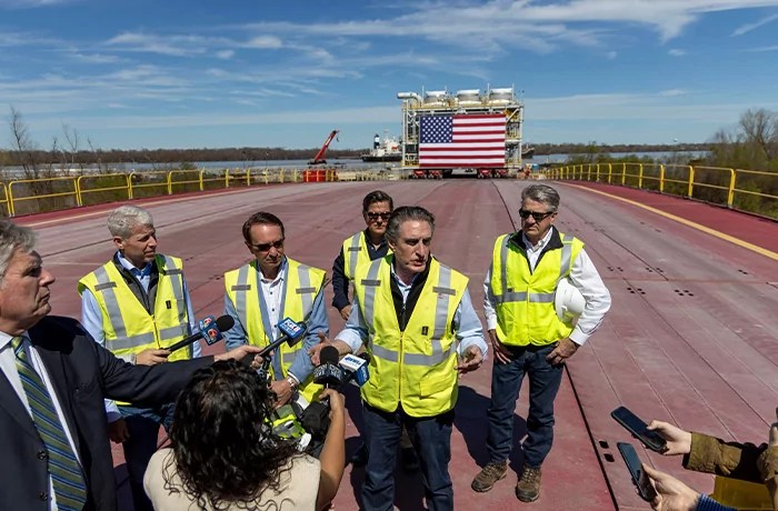 Energy Secretary Chris Wright, Gov. Jeff Landry (R-LA), Mike Sabel of Venture Global LNG, Interior Secretary Doug Burgum, and Bob Pender of Venture Global LNG.