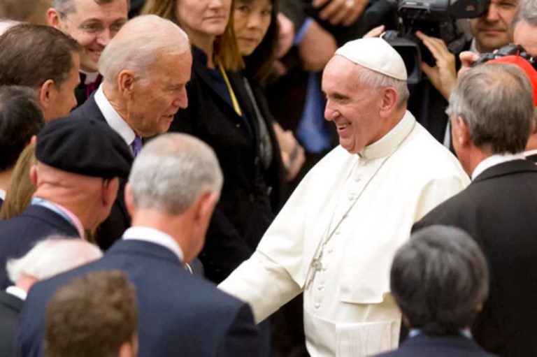 United States Vice President Joe Biden, left, shakes hands with Pope Francis during a congress on the progress of regenerative medicine held at the Vatican, Friday, April 29, 2016.