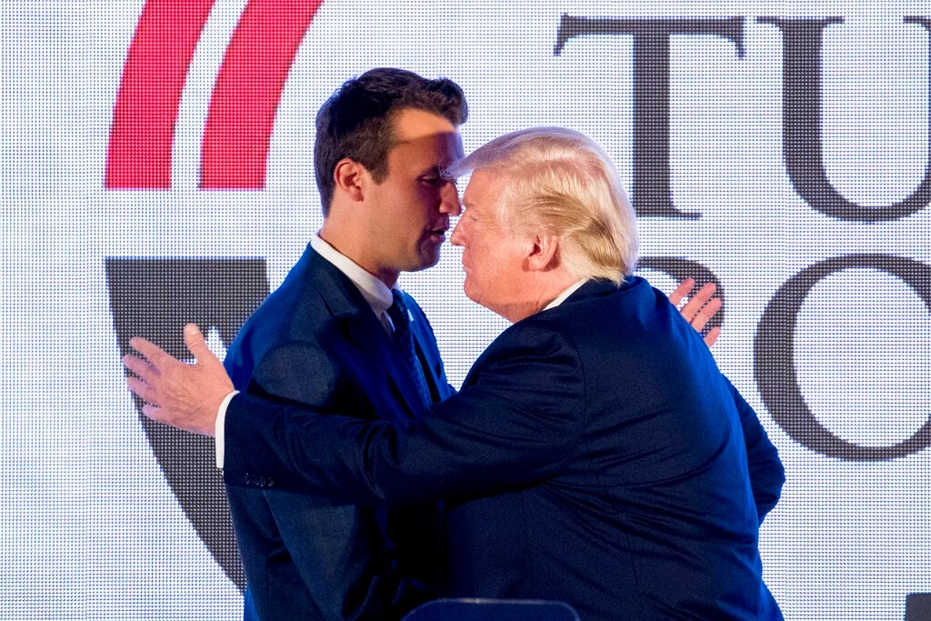 President Donald Trump shakes hands with Turning Point USA Founder Charlie Kirk as he finishes speaking at Turning Point USA Teen Student Action Summit at the Marriott Marquis in Washington, Tuesday, July 23, 2019. 