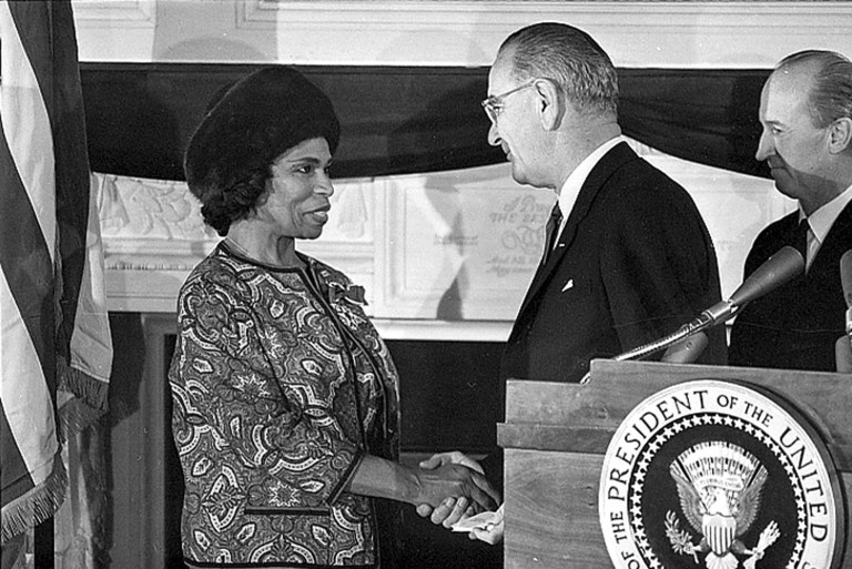 Singer Marian Anderson, left, is congratulated by President Lyndon B. Johnson during presentation ceremonies of the Presidential Medal of Freedom at the White House in Washington, D.C., on Dec. 6, 1963.