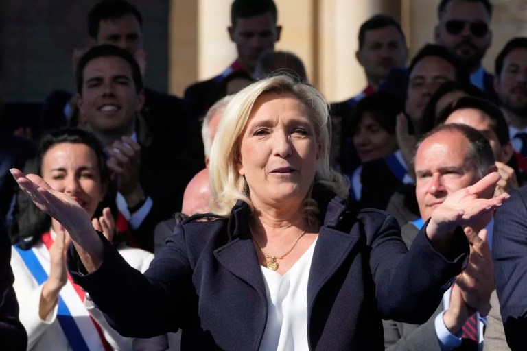 French right-wing leader Marine Le Pen reacts during the National Rally protest near the parliament in Paris, Sunday, April 6, 2025.