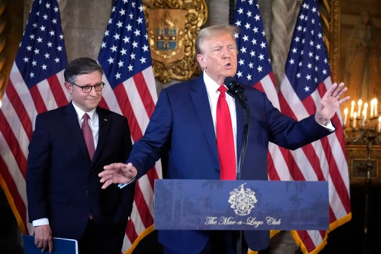 Former President Donald Trump, Republican presidential candidate, speaks as House Speaker Mike Johnson (R-LA) listens during a news conference, Friday, April 12, 2024, at Mar-a-Lago in Palm Beach, Florida.