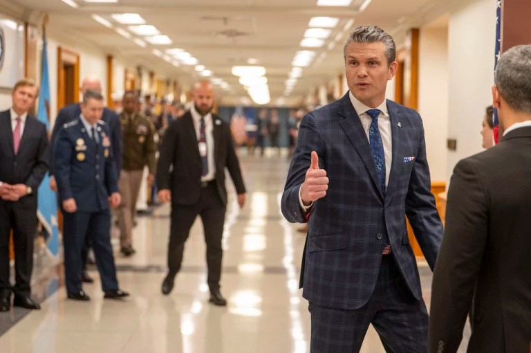 Defense Secretary Pete Hegseth, right, walks into a meeting with NATO Secretary General Mark Rutte at the Pentagon, Thursday, April 24, 2025 in Washington.